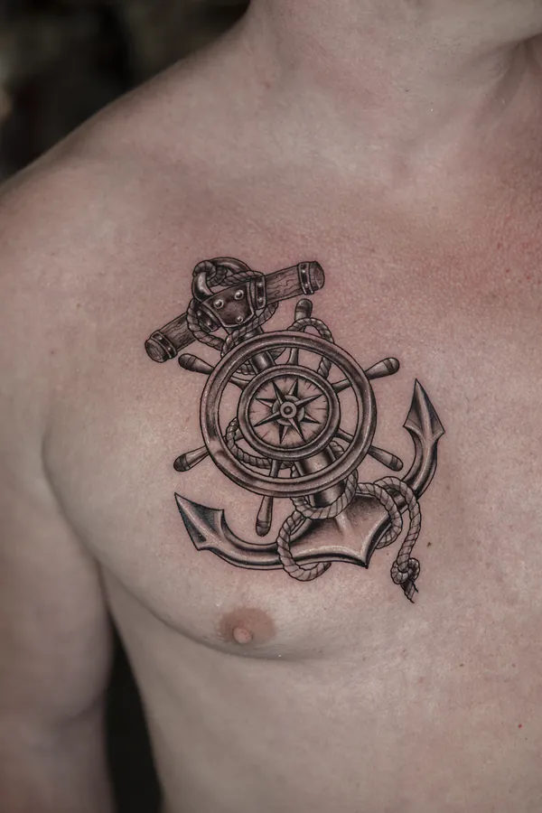 Ship wheel and anchor chest tattoo Bangkok by Ballin