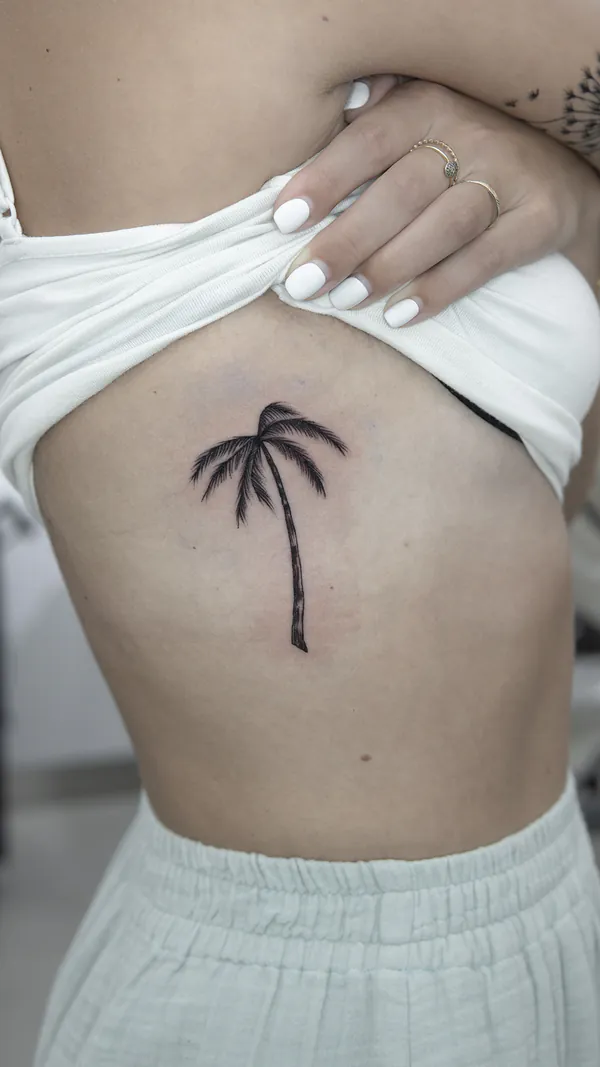 Palm tree rib tattoo Bangkok by Ballin