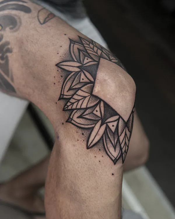 Negative space floral shoulder blackwork tattoo Bangkok