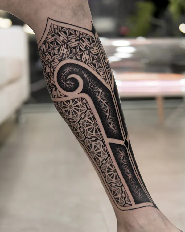 Geometric spiral shin blackwork tattoo Bangkok