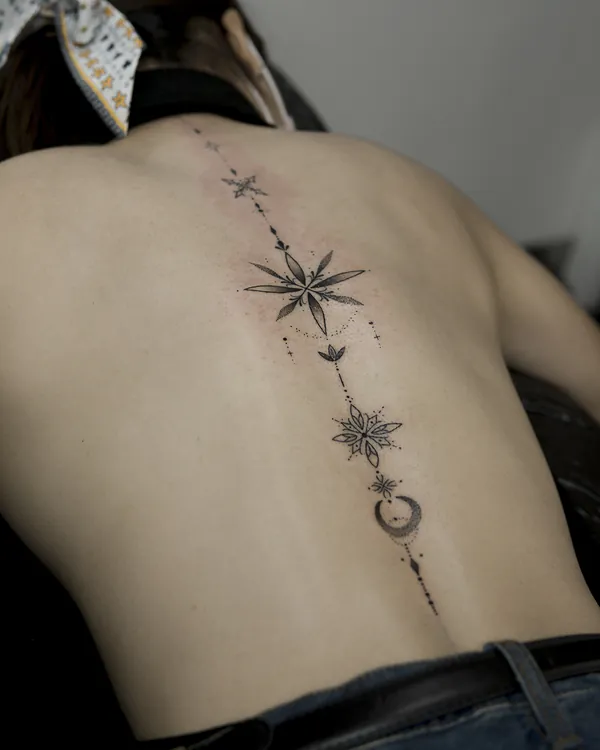 Dotwork stars crescent moon spine feminine girly tattoo Bangkok