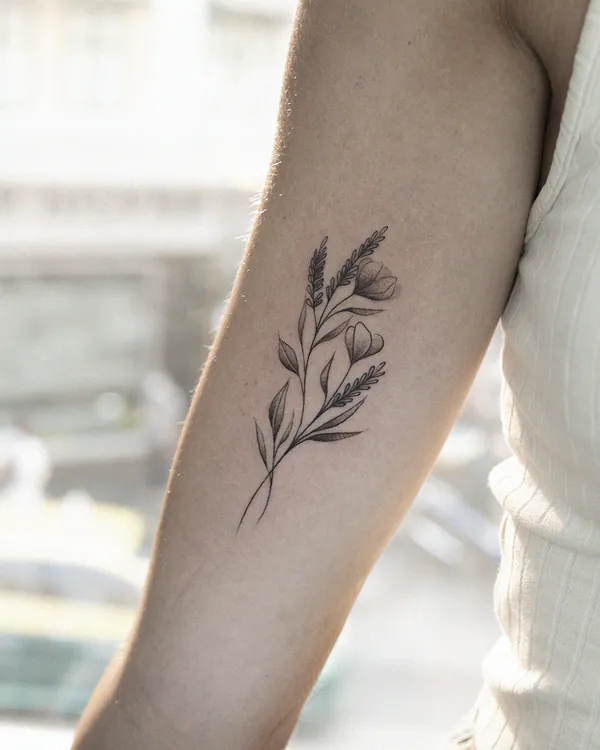 Botanical wildflower branch arm feminine tattoo Bangkok
