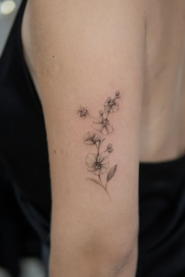 Fine line wildflowers with bee arm feminine girly tattoo Bangkok