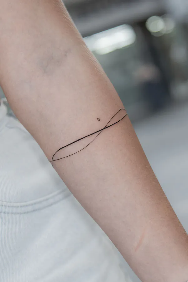 Minimalist infinity line forearm feminine tattoo Bangkok