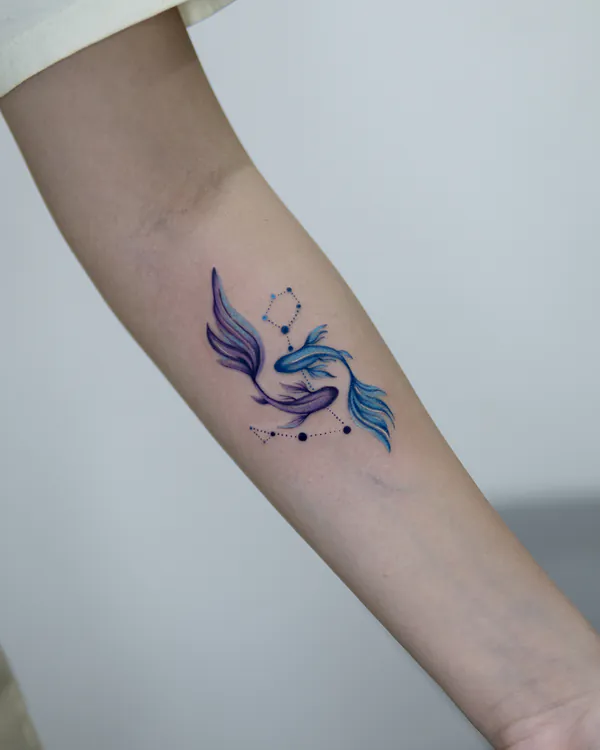 Watercolor betta fish constellation forearm feminine tattoo Bangkok