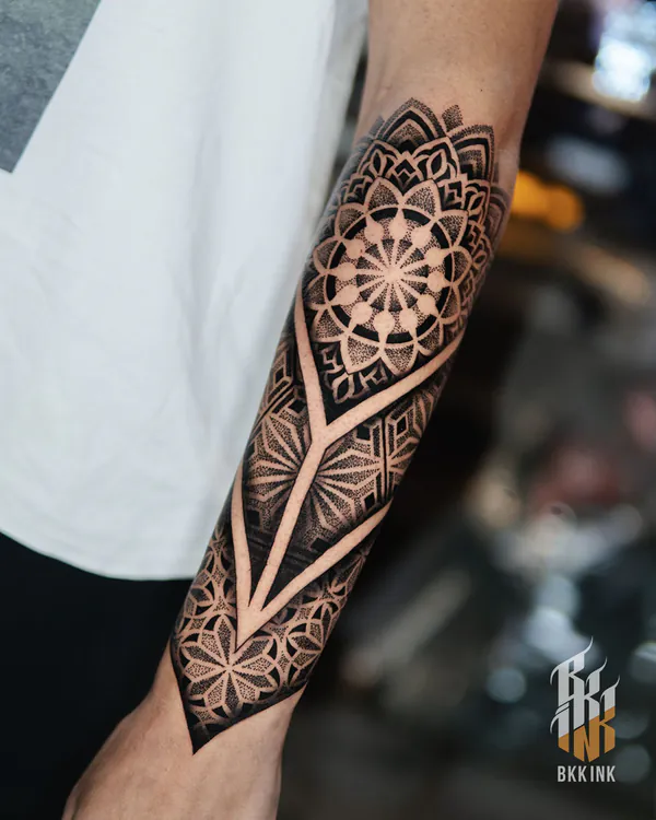 Geometric mandala dotwork forearm tattoo Bangkok by Hack