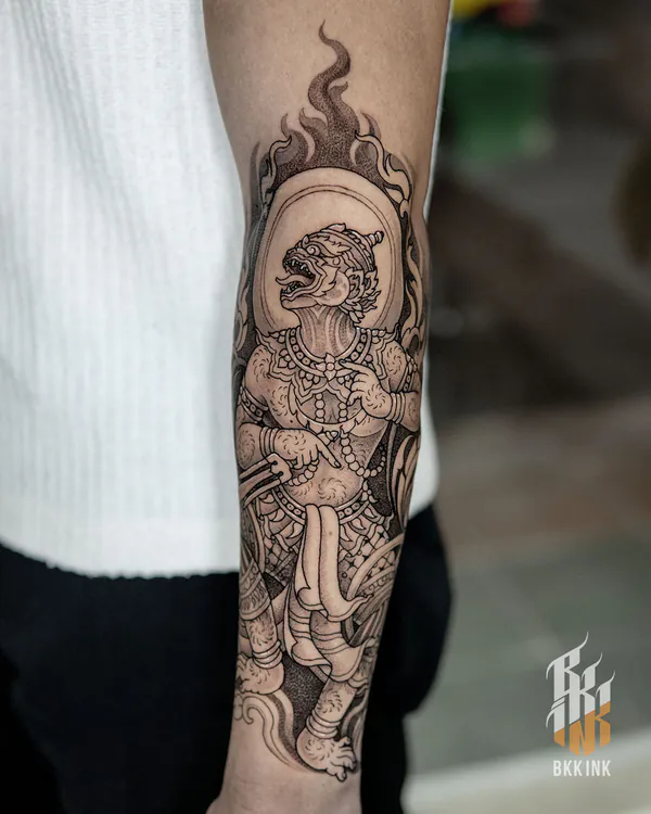 Thai guardian demon with flame halo forearm tattoo Bangkok by Jack