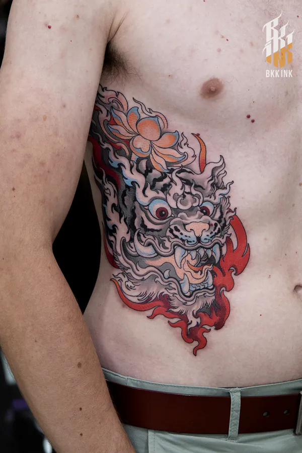 Tiger and lotus flower ribs tattoo Bangkok by Jack