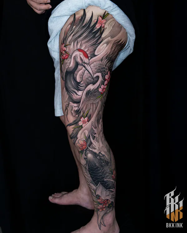 Crane, cherry blossom and koi full leg Japanese tattoo Bangkok