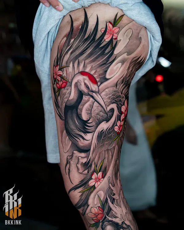 Crane and cherry blossom thigh close-up Japanese tattoo Bangkok