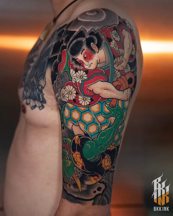Folklore figure and chrysanthemum shoulder Japanese tattoo Bangkok