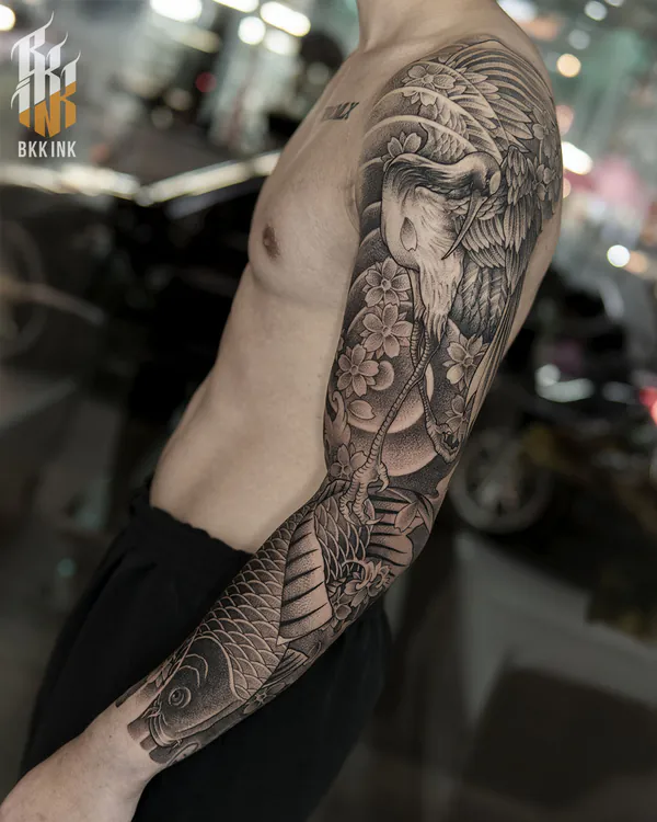 Crane and koi fish full sleeve Japanese tattoo Bangkok