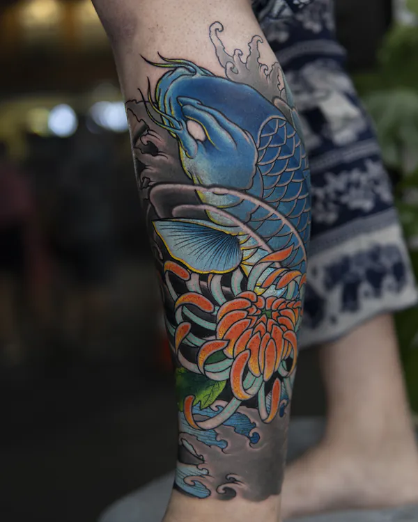 Blue koi and chrysanthemum calf Japanese tattoo Bangkok