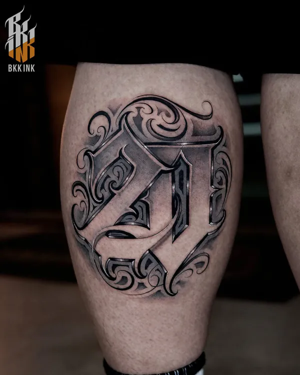 Ornate Old English letter shin lettering tattoo Bangkok