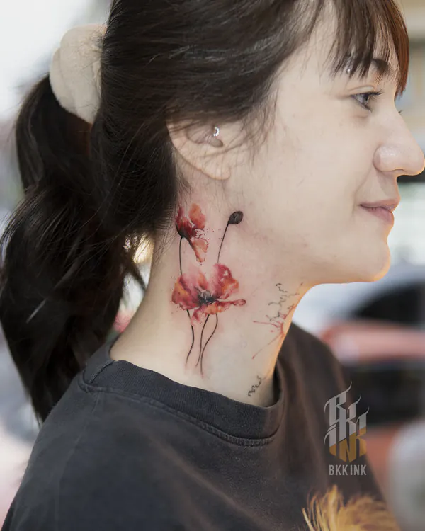 Watercolor poppy flowers neck tattoo Bangkok by Mo