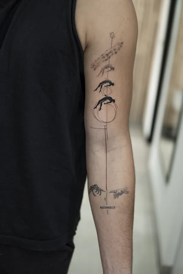 Minimalist diver figures with Creation of Adam hands arm tattoo Bangkok by Mo