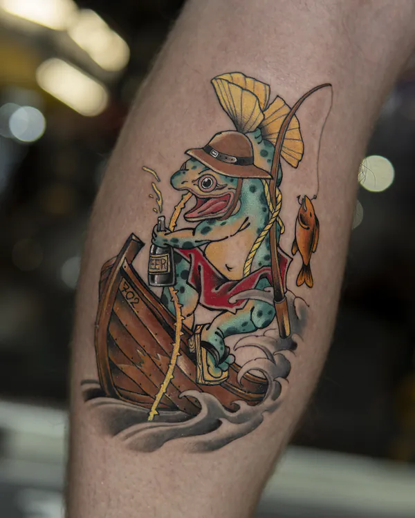 Colour frog fisherman in rowboat calf neo-traditional tattoo Bangkok