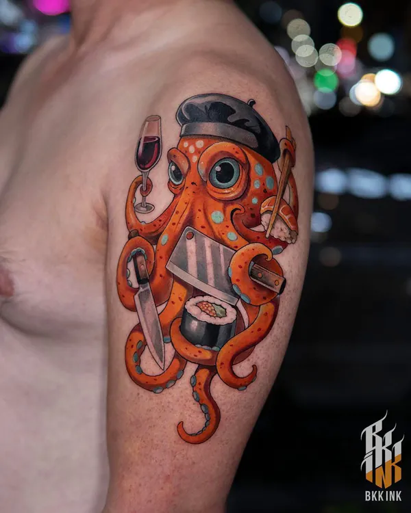 Colour octopus chef with sushi knife upper arm neo-traditional tattoo Bangkok