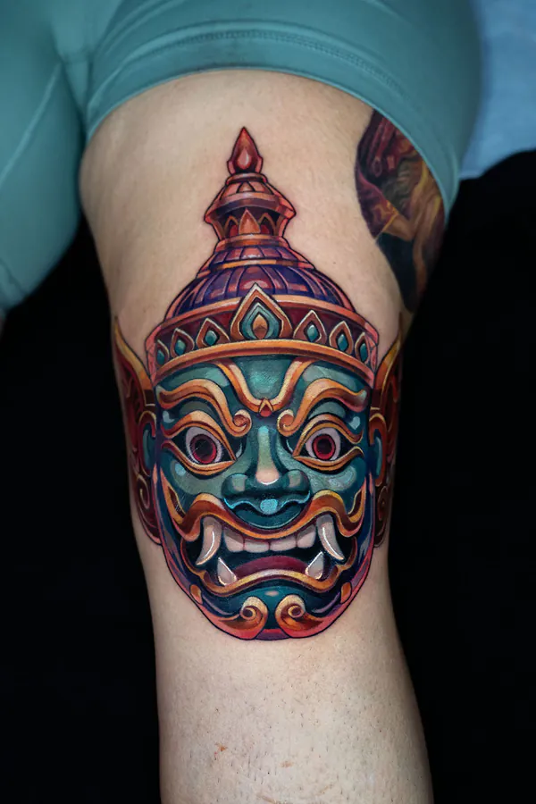Colour Thai giant guardian mask knee neo-traditional tattoo Bangkok