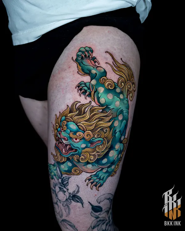 Colour teal qilin creature thigh neo-traditional tattoo Bangkok