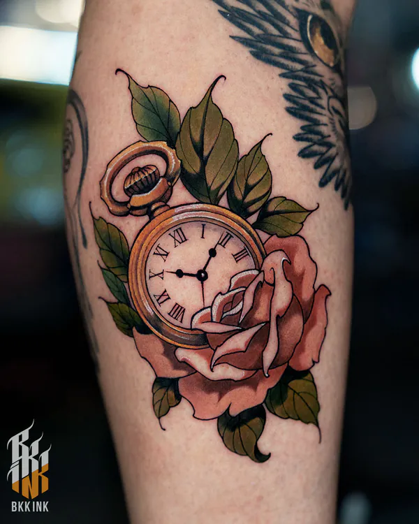 Colour pocket watch with rose forearm neo-traditional tattoo Bangkok