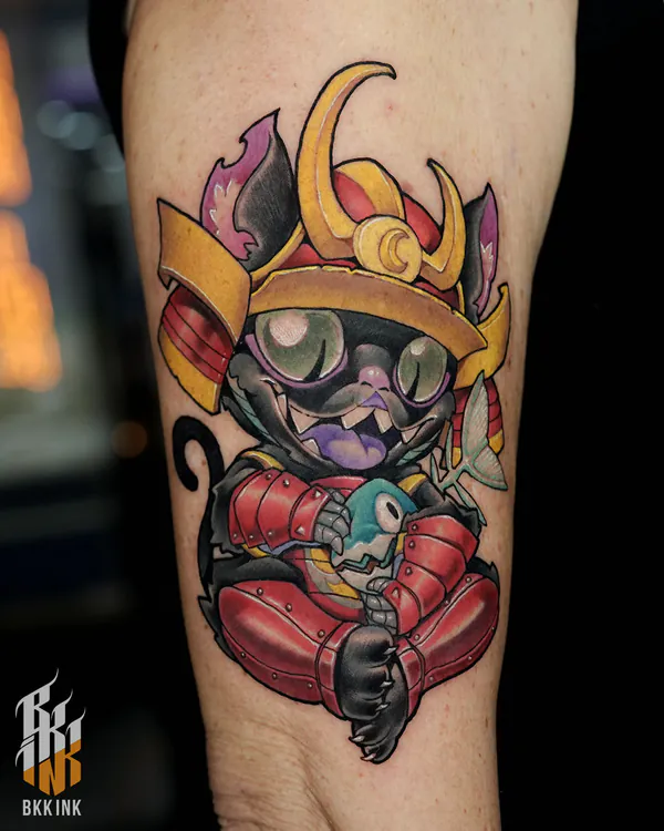 Samurai cat holding blue bird forearm new school tattoo Bangkok
