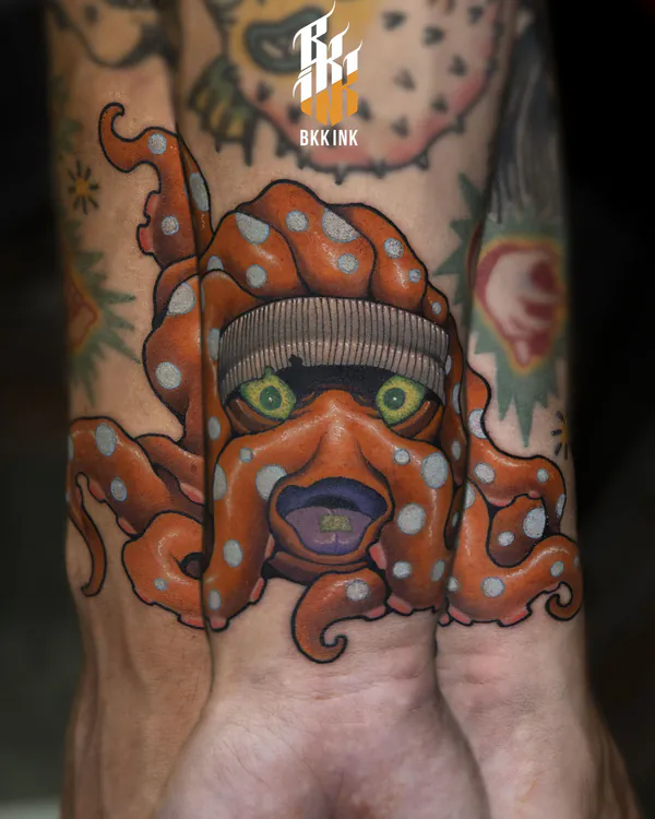 Octopus wearing knit beanie hand new school tattoo Bangkok