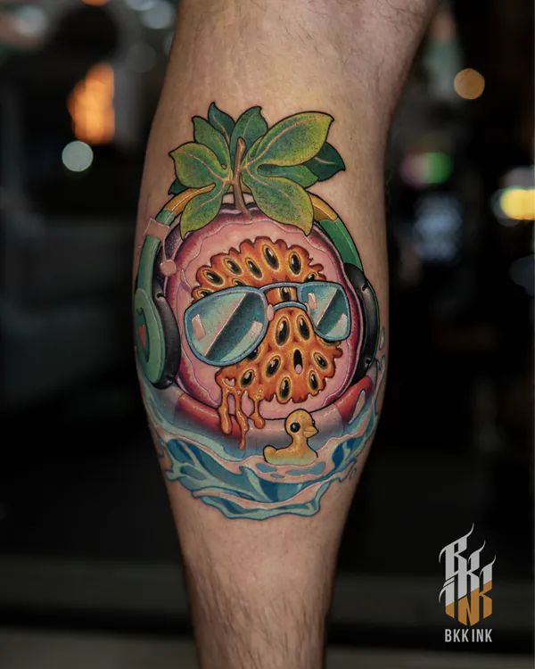 Durian character with headphones calf new school tattoo Bangkok