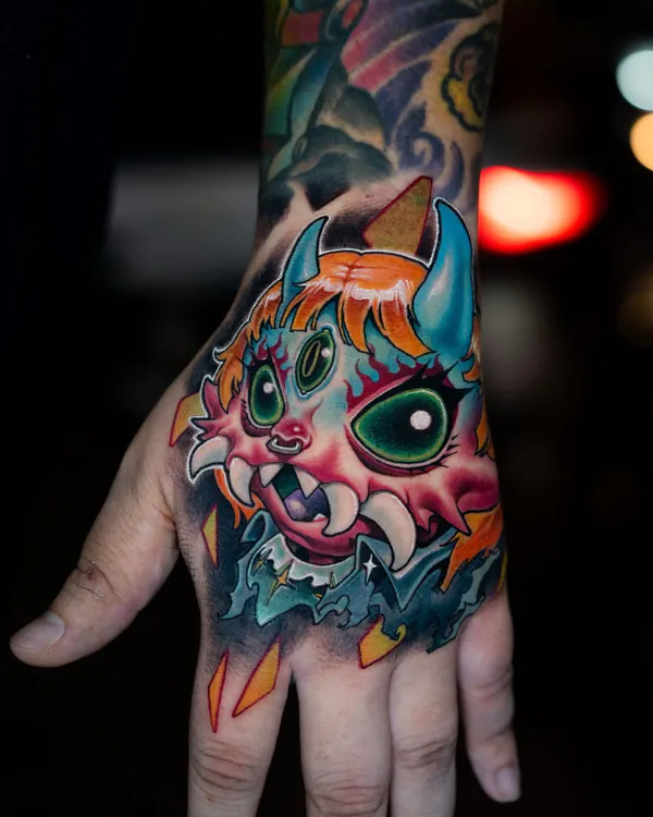 Horned demon creature hand new school tattoo Bangkok