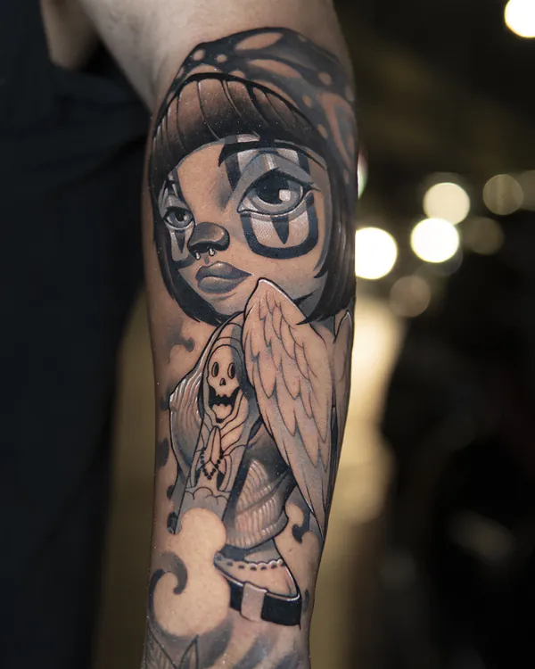 Cat-masked girl with skeleton angel forearm new school tattoo Bangkok