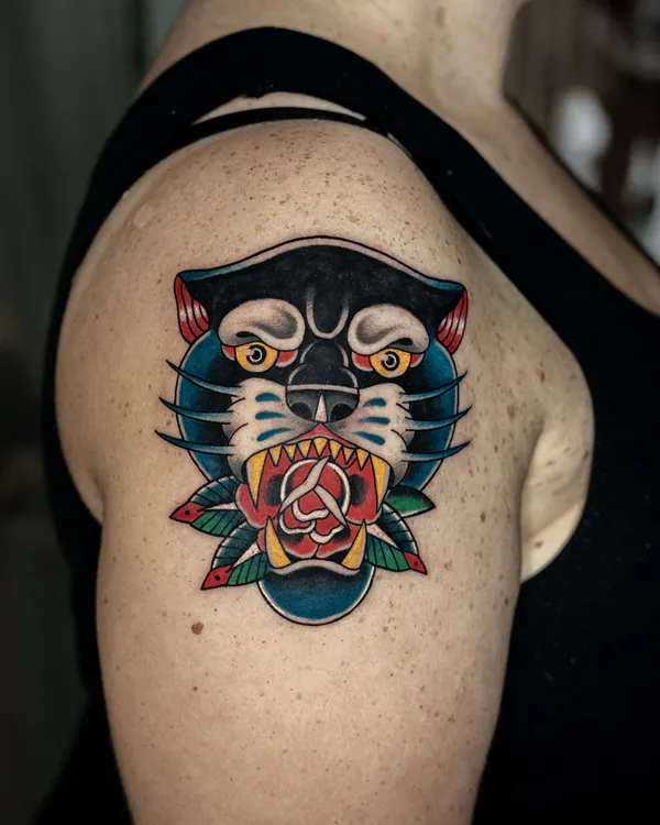 Panther head with rose shoulder old school tattoo Bangkok