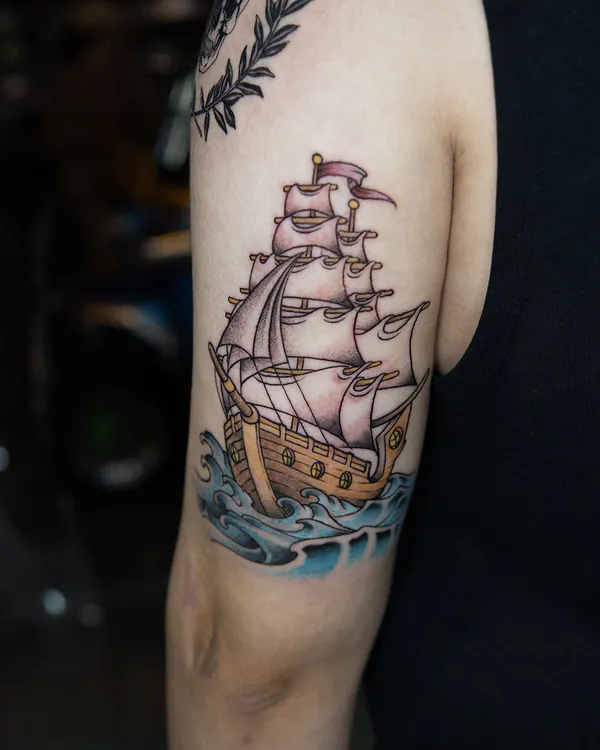 Tall sailing ship on waves arm old school tattoo Bangkok