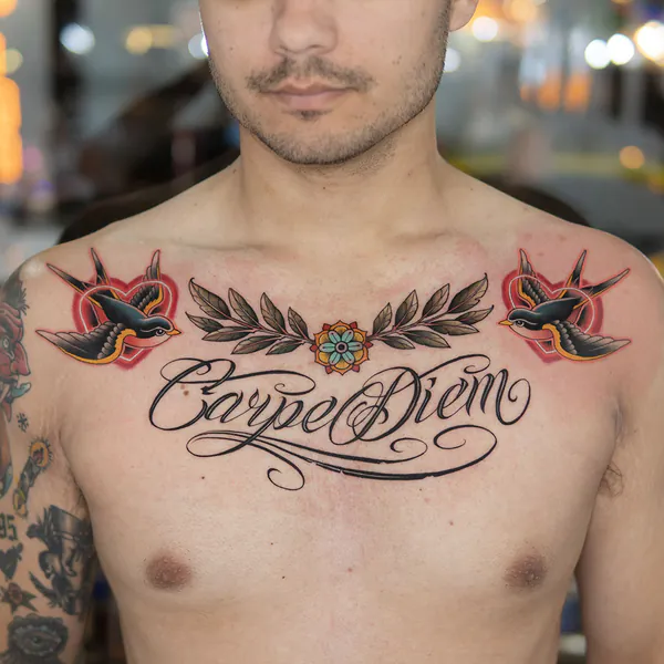 Carpe Diem script with swallows chest old school tattoo Bangkok