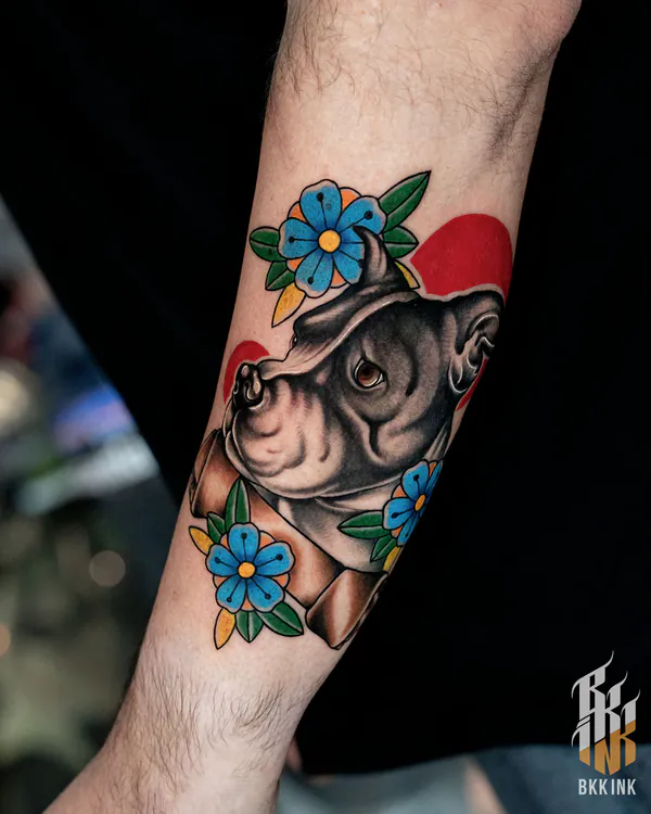 Pitbull head with blue flowers forearm old school tattoo Bangkok