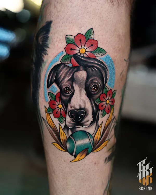Pitbull portrait with red flowers calf old school tattoo Bangkok