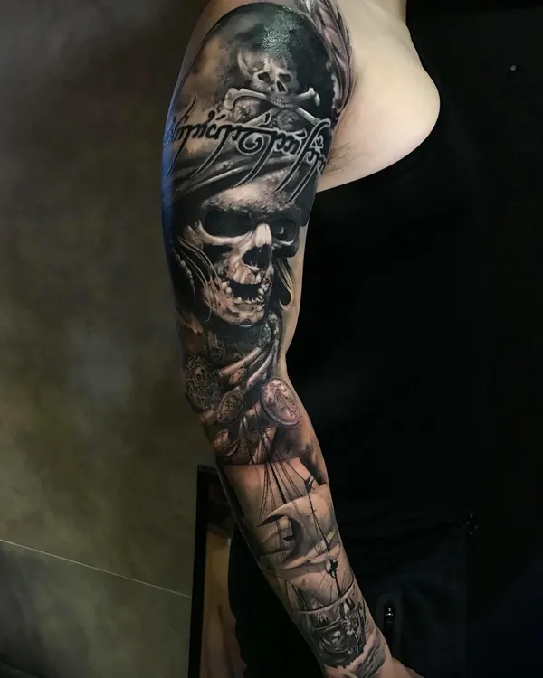 Pirate skull with ship full sleeve realistic tattoo Bangkok