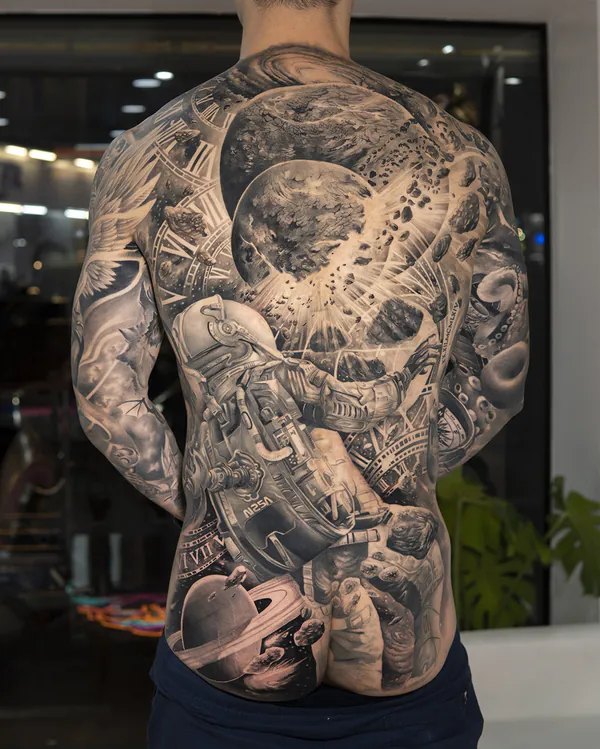Astronaut space scene full back realistic tattoo Bangkok