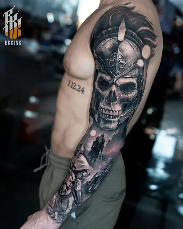 Skull warrior helmet upper arm realistic tattoo Bangkok
