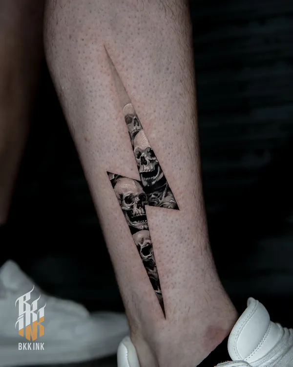 Lightning bolt skulls calf realistic tattoo Bangkok