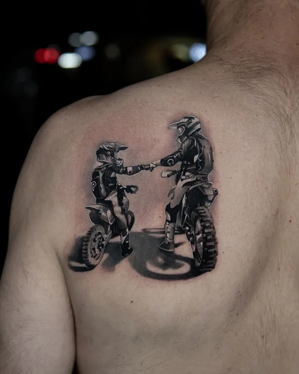 Motocross riders fist bump shoulder realistic tattoo Bangkok