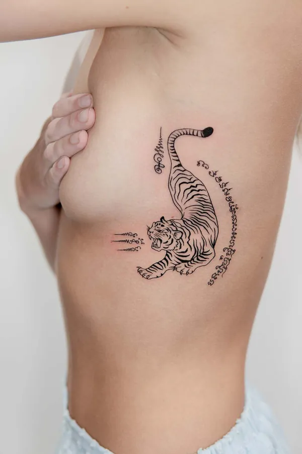 Tiger prowling ribs Sak Yant tattoo Bangkok