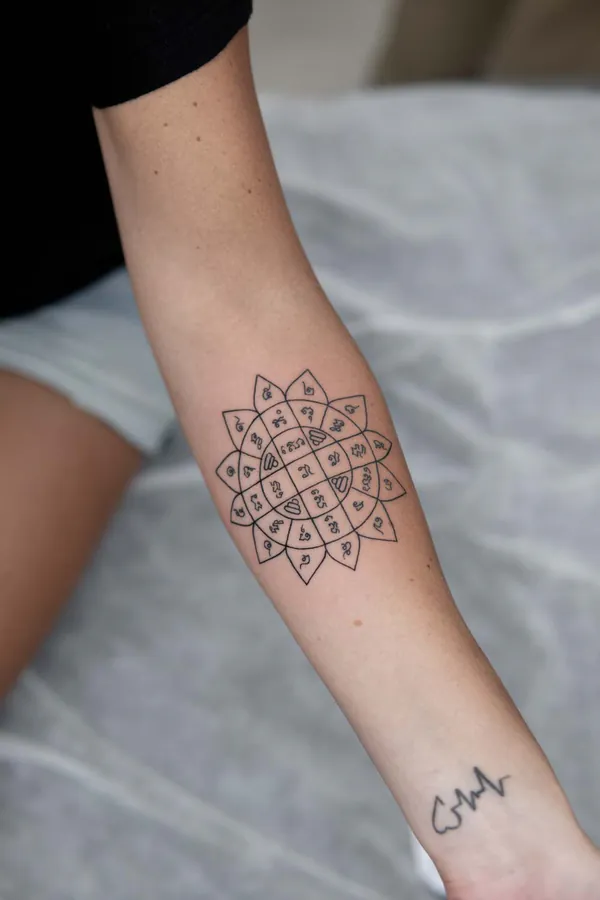 Lotus mandala yant forearm Sak Yant tattoo Bangkok