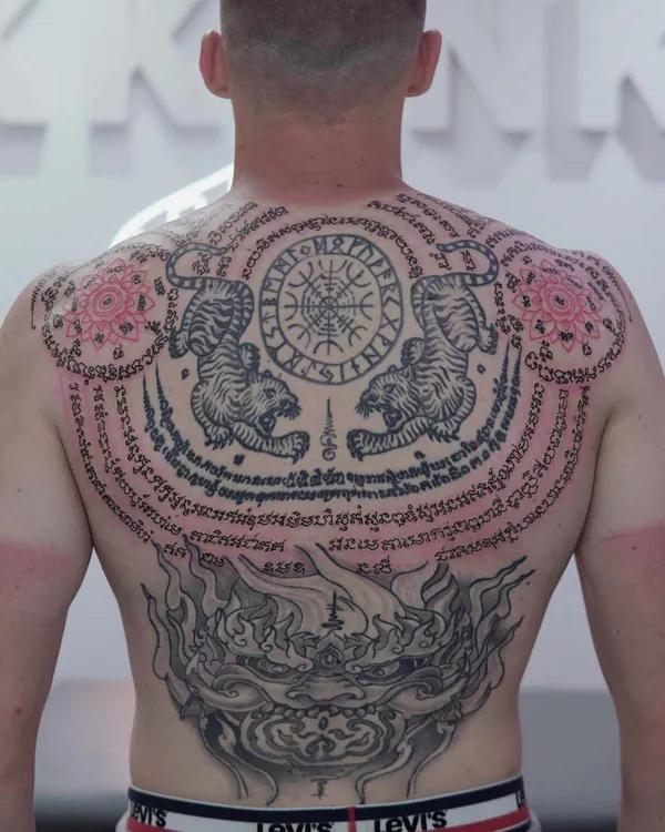 Twin tigers compass wheel full back Sak Yant tattoo Bangkok