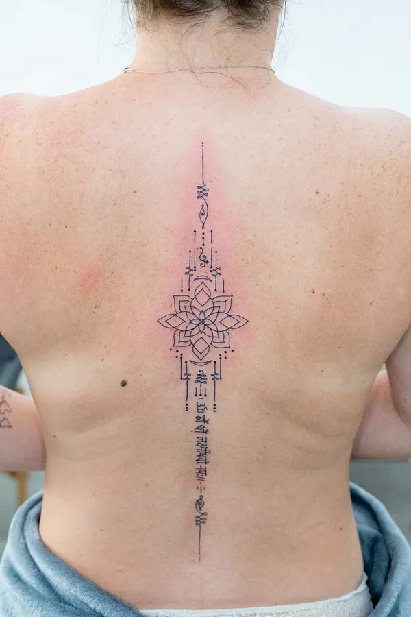 Lotus mandala spine Sak Yant tattoo Bangkok