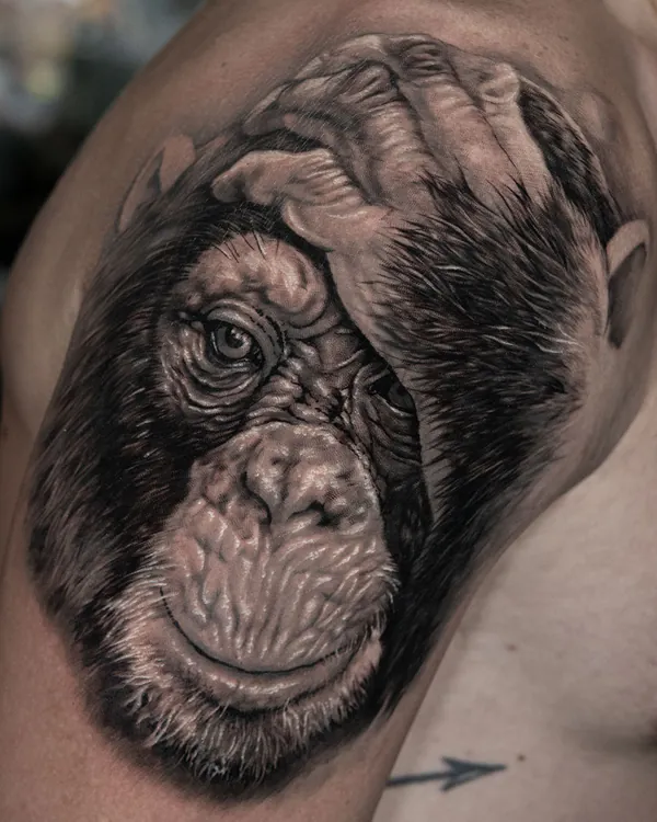 Chimpanzee covering eye shoulder tattoo Bangkok by Zia