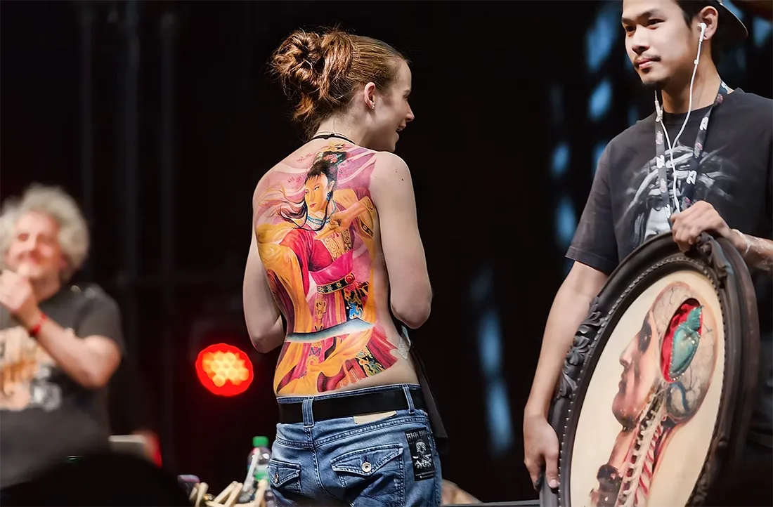 Ball BKK's Best of Full Back winning tattoo presented on stage at the Mondial du Tatouage convention, BKK INK Bangkok