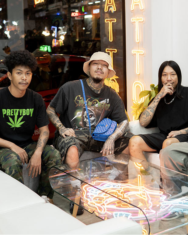 YOUNGOHM, Thai rap superstar, with friends in the BKK INK studio lounge on Khaosan Road